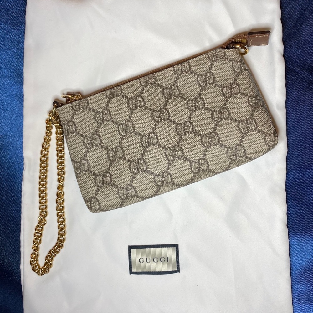 Gucci wristlet 💯 authentic & mint condition